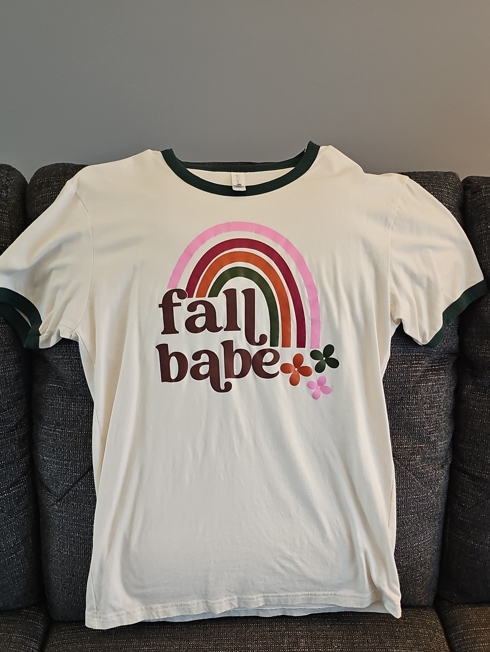 Next Level Apparel Cream Ringer Tee with Green Trim and Retro Rainbow